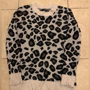 Aqua cashmere sweater with distressed hems and edges. Size XS